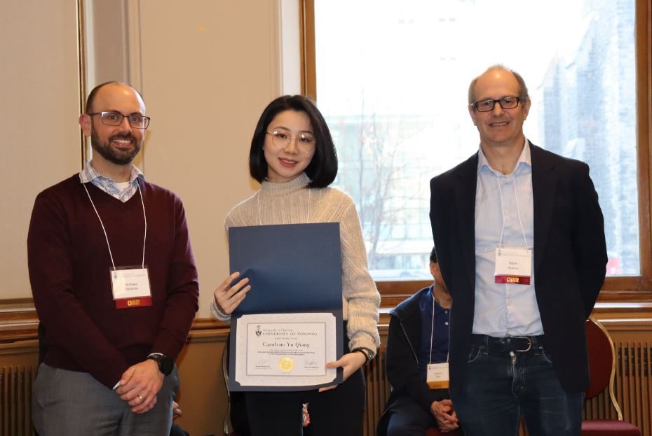 Carolyne Qiang receiving her OGS certificate